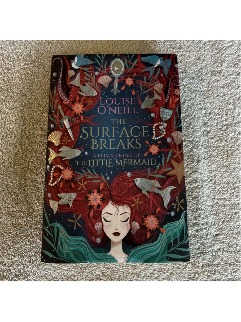 The Surface Breaks: A Reimagining of The Little Mermaid" by Louise O'Neill